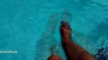 Feet in Pool with Lots of Water