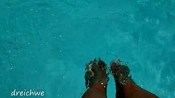 Feet in Pool with Lots of Water