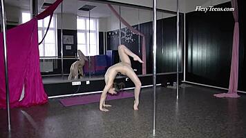 hey, watch this russian black-haired gymnast stumble through amateur moves.