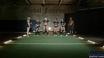 Sexy black teen 18+ strips and rips clothes during intense gym workout.