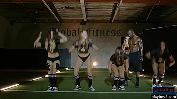 Sexy black teen 18+ strips and rips clothes during intense gym workout.