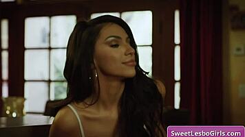 Kylie Rocket seduces Maya Woulfe, licking her big tits.