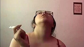 Wife touches herself with vibrator, showing big tits and ass