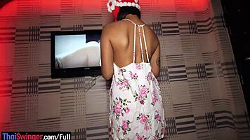 Round ass thai teen gives homemade blowjob while rubbing dick on pussy