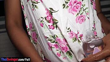 Round ass thai teen gives homemade blowjob while rubbing dick on pussy