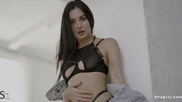 Petite tattooed babe rips clothes in lingerie, showing shaved pussy