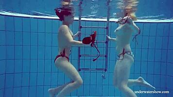 Marusia and melisa darkova bathe in bikini underwater.