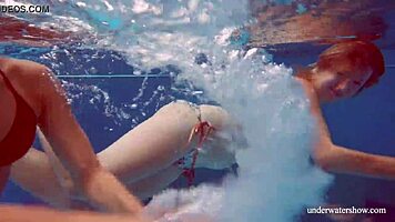 Marusia and melisa darkova bathe in bikini underwater.