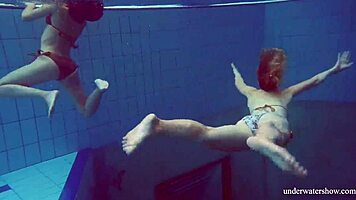 Marusia and melisa darkova bathe in bikini underwater.