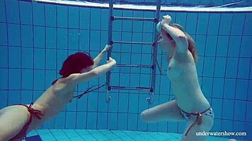 Marusia and melisa darkova bathe in bikini underwater.