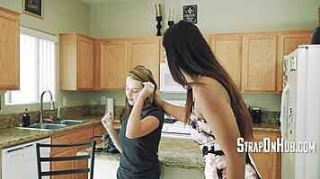 aggressive dyke dominates tiny blonde in wild scissoring session