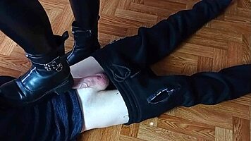 girls in boots dominate with footjob