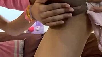 Petite teen stuffs panties then vibrates