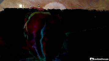 tattooed teen sucks cock on her knees in the kitchen