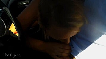 young blonde girlfriend drives with her boyfriend in the car