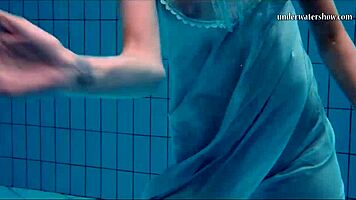 Hot Teen Swims And Strips Underwater!