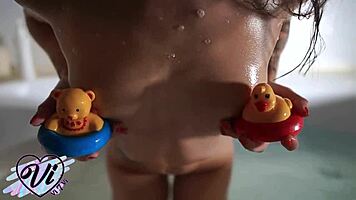 Beautiful babe masturbates to orgasm while smoking in bathroom