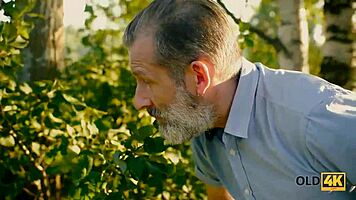 posh girl whispers to older tourist, nail me in this clearing