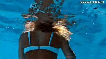 Hungarian blonde skinny pornstar enjoys swimming in the pool