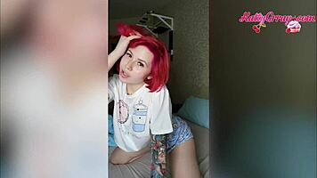 Redhead Bitch Rocks a Buttplug While Teasing Her Tight Pussy in Homemade Action!