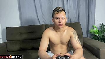 Petite latina strips naked while he plays video game, offering her big clit pussy for monster cock fuck and cum