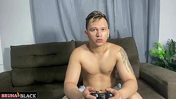 Petite latina strips naked while he plays video game, offering her big clit pussy for monster cock fuck and cum