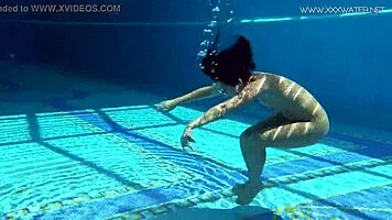 Jessica Lincoln, tatted Russian teen, bares small tits by pool