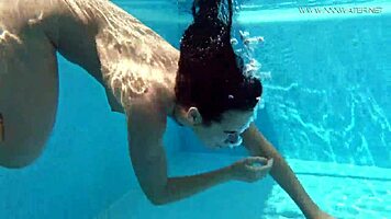 Jessica Lincoln, tatted Russian teen, bares small tits by pool