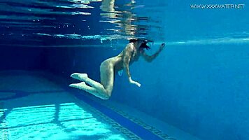 Jessica Lincoln, tatted Russian teen, bares small tits by pool