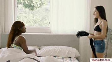 Skinny girl intensely licks busty ebony's wet pussy