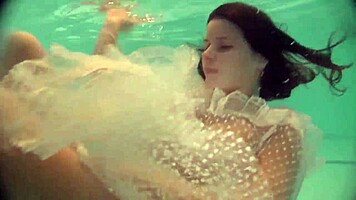 Russian Babe Natalia Swims And Strips