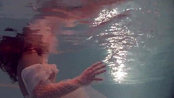 Russian Babe Natalia Swims And Strips