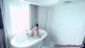 horny lesbian masturbates by the pool with fingering