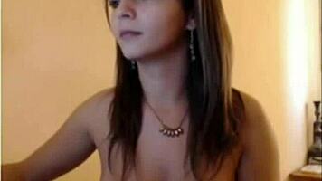 Beautiful camgirl teases with big tits and ass