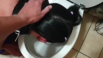 emo bondage slut dragged to toilet for piss and cock sucking