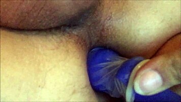 tight asshole stretched by huge butt plug in femdom play