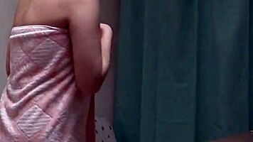 Wow, young japanese girl exposes natural tits in shower webcam!