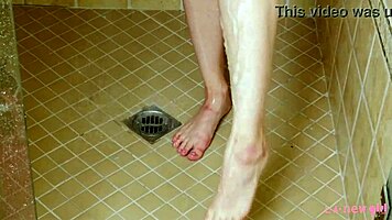 Captivating Brunette Enjoys Sensual Shower with Steamy Lesbian Vibes