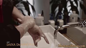 Does the stepmom strap on to fuck the teen in this lesbian threesome?