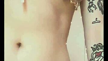 Kawaii woman shows her natural tits in the bedroom