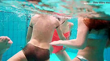 Avenna, Nina Mohnatka, and Marketa dive into steamy pool fun with bikini babes
