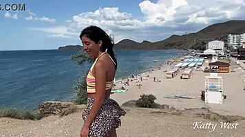 peeing publicly near beach with crowd watching