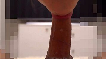 cream in mouth as she licks cock and notices