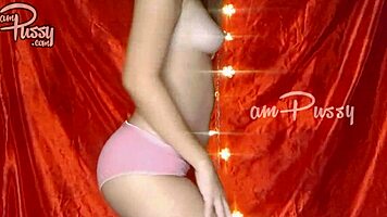 Amateur girl strips and poses naked.