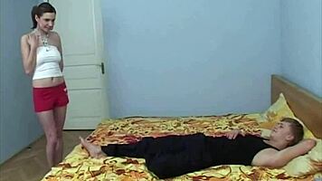 filimon and hannah record a free video in their college dorm bedroom while roommates are at work.