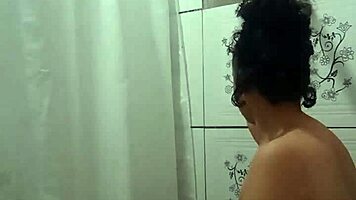 Enjoying a hot shower while fingering my tight pussy