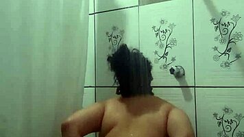Enjoying a hot shower while fingering my tight pussy