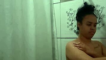 Enjoying a hot shower while fingering my tight pussy