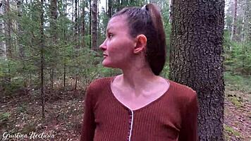 Russian couple captures unexpected intimate moment in the woods with ponytail and natural setting