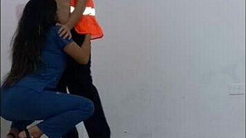 Hospital cleaner seduces nurse, puts on condom, and fucks her like a slut standing in office hallways.